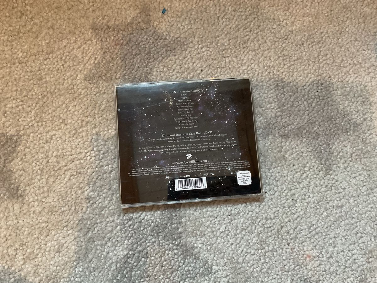 CD: Robbie Williams - Intensive Care CD + Bonus DVD – Usato da Grub SG venduto da Vinciguerra 1