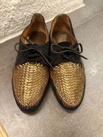 Chaussures vintage dorées et noires