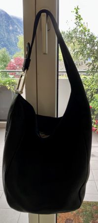 Gucci Lederbeutel mit Metallornament