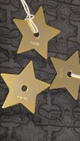 3 Dior Sterne aus Metall