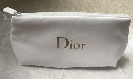 Brand new snow-white Dior bag with gold embossed logo