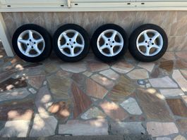 À vendre 4 Jantes 4/100 avec pneus