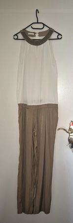 Schöner Jumpsuit von Promod mit goldenen Details, Grösse 40