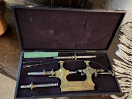 Outil d'horlogerie ancien en coffret état usage