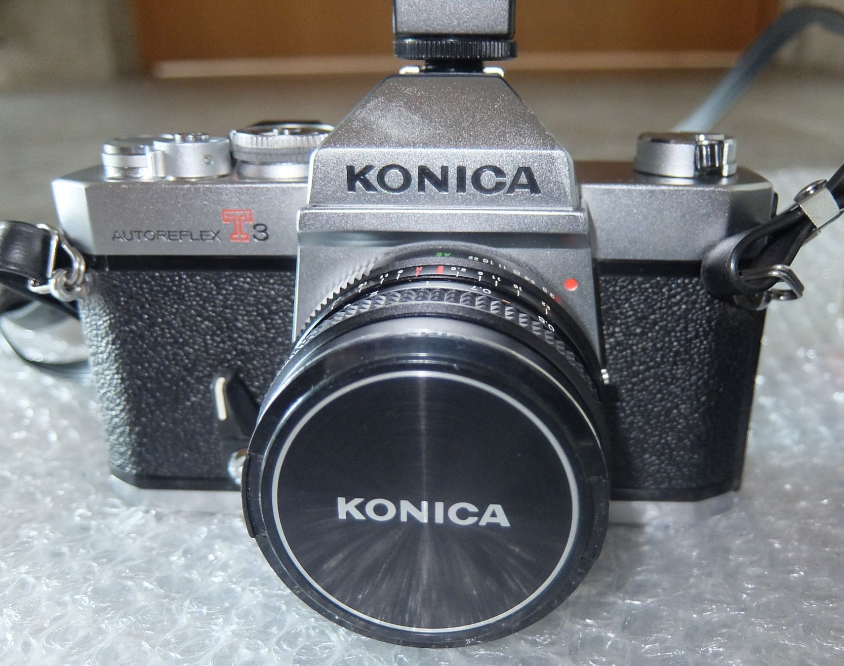 Konica Fotocamera: Konica Autoreflex T3 Kamera mit Objektiv und Blitz – Usato da Basel venduto da Elektronik_Markt 1