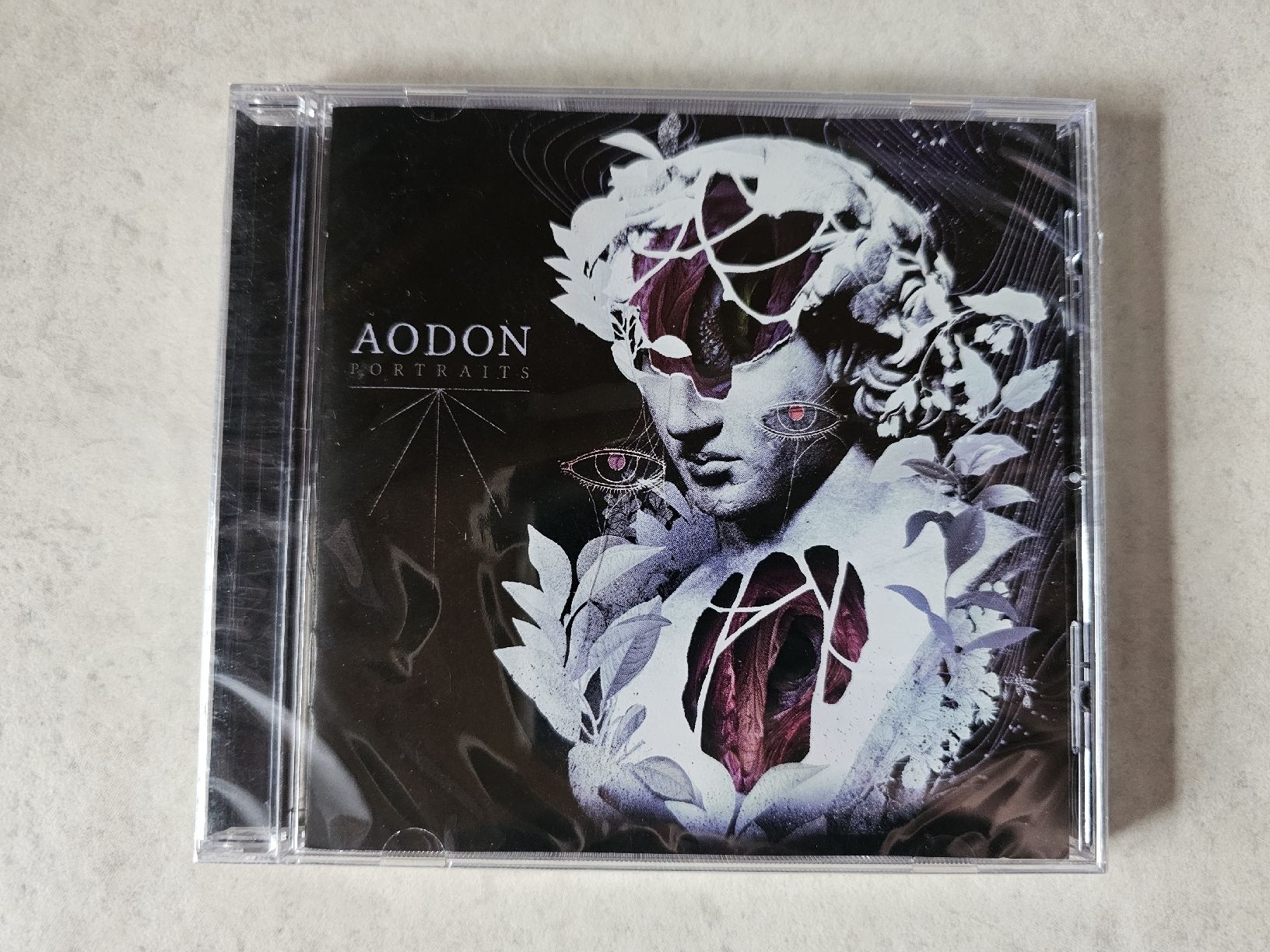 CD: Aodon  -  Portraits  /  Fabrikneu – Nuovo e nell'imballaggio originale da Schneisingen venduto da backstore24