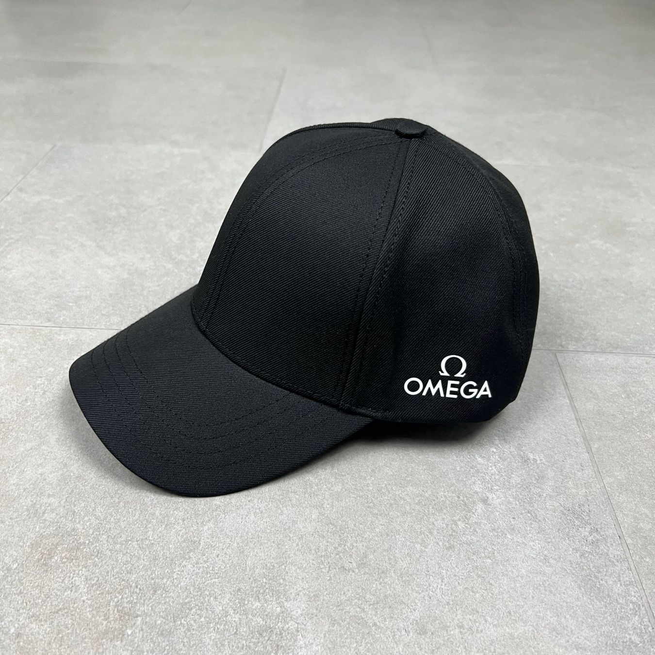 Chapeaux, bonnets & casquettes: Omega Logo Cap – Neuf (Voir description) à Biel/Bienne par sami0788480082