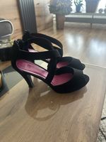 Sandalen mit Absatz