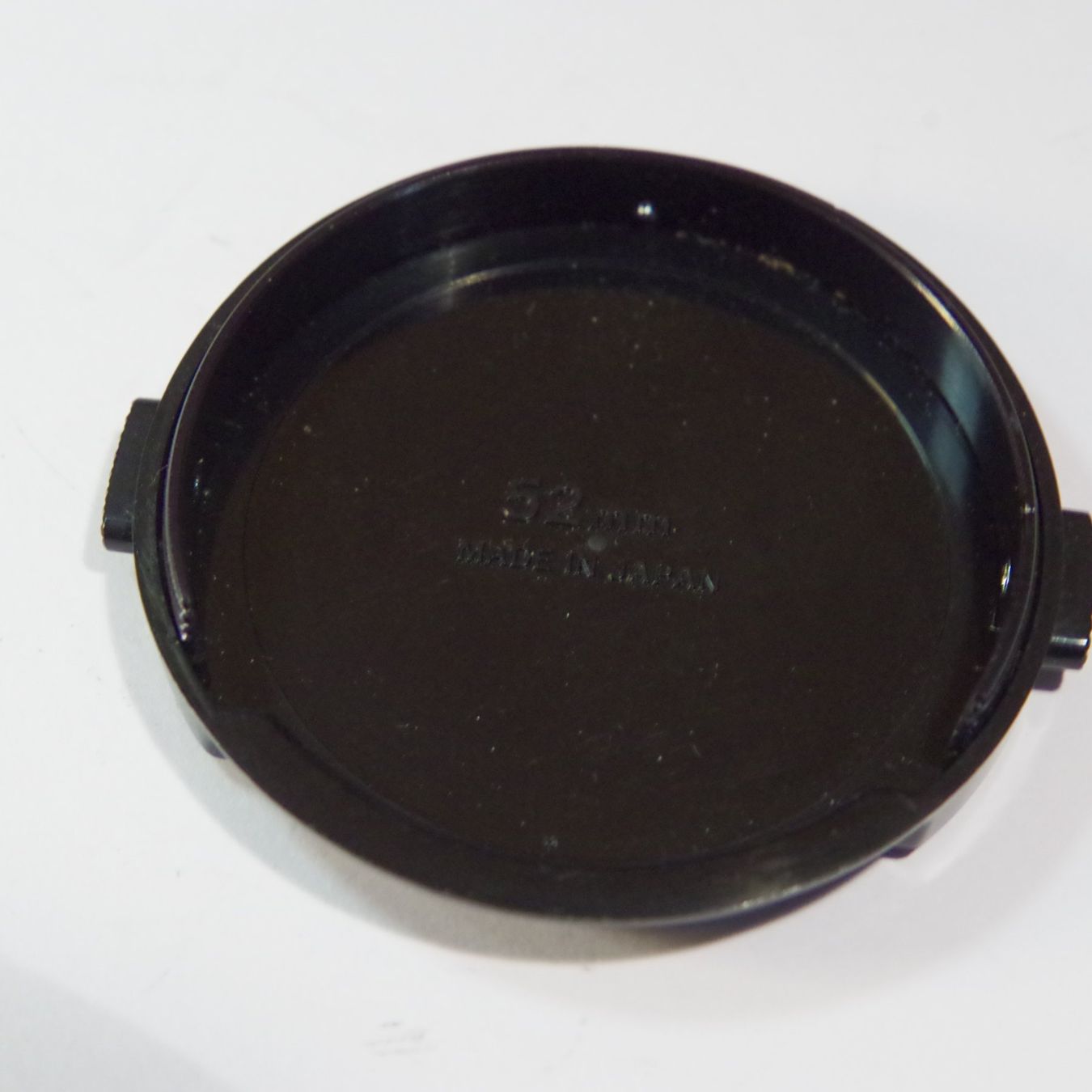 Nikon Obiettivi: Nikon Objektivdeckel 52mm altes Design schwarz – Usato da Erlinsbach venduto da foto_5018 1