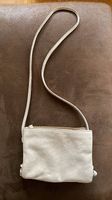 Sac bandoulière brillant mate en cuir