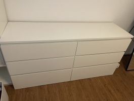 White chest of drawers.