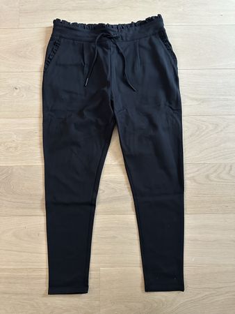 Pantalon noir style décontracté et élégant, style chino / jo