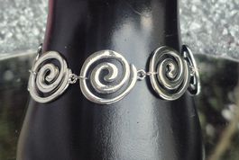 Bracciale donna spirale color argento regolabile nuovo