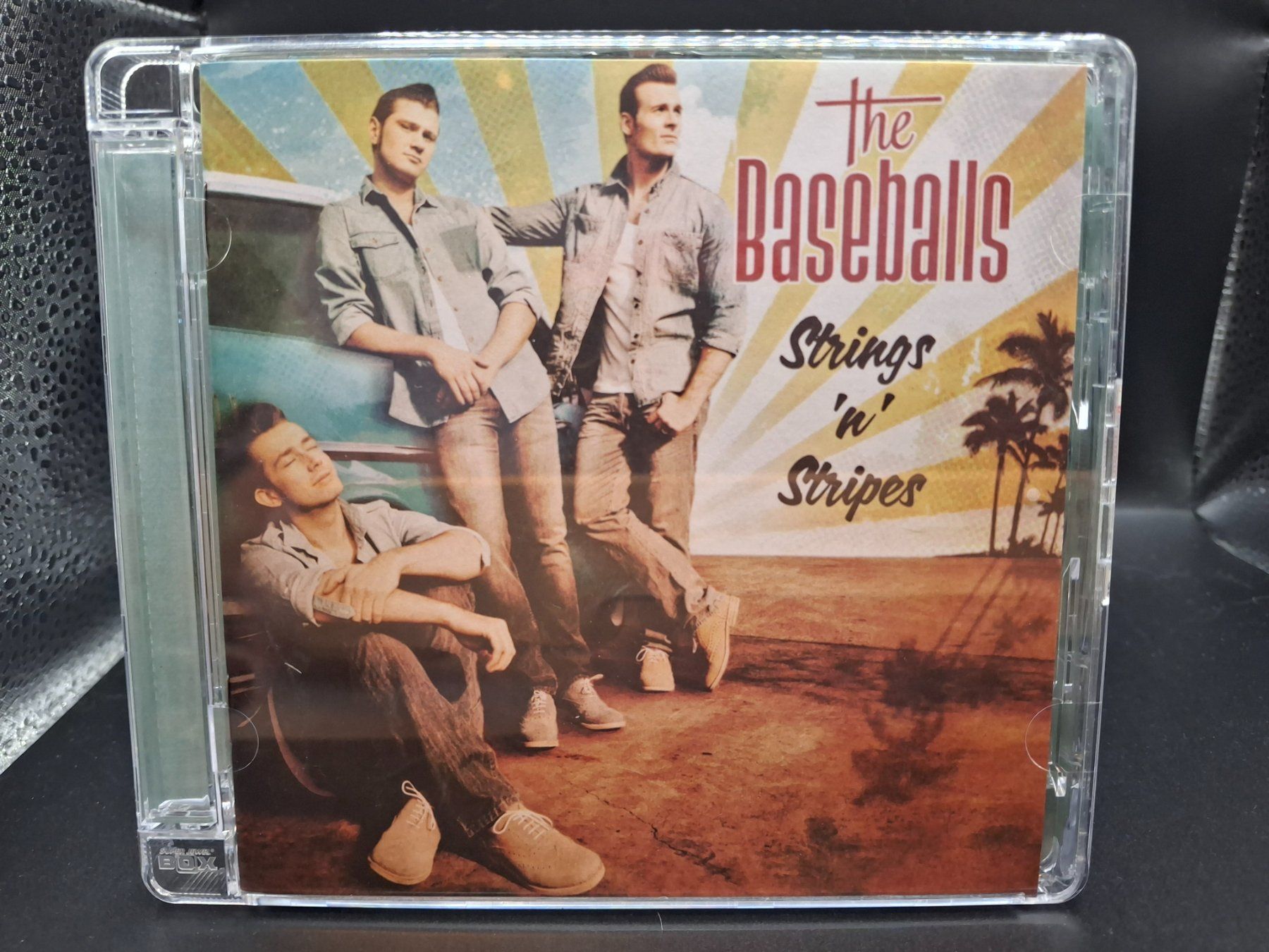 CDs: The Baseballs – Strings 'n' Stripes – Gebraucht aus St.Gallen von jalamusic
