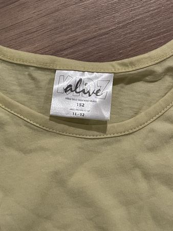 Langarmshirt Alive gelb Grösse 152