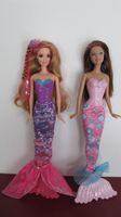 Zwei schöne Barbie Meerjungfrauen