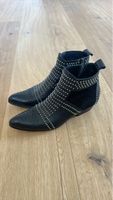 Bottines noires à clous, style santiag,  ANINE BING 40 fr