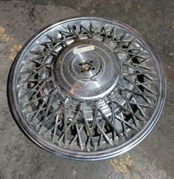 1 enjoliveur Cadillac environ année 70