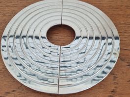 Sous-plat extensible en métal argenté C26