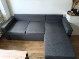 Graues ausziehbares Sofa mit Stauraum