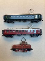 Märklin, Spur H0, 1 Lokomotive und 2 Personenwagen
