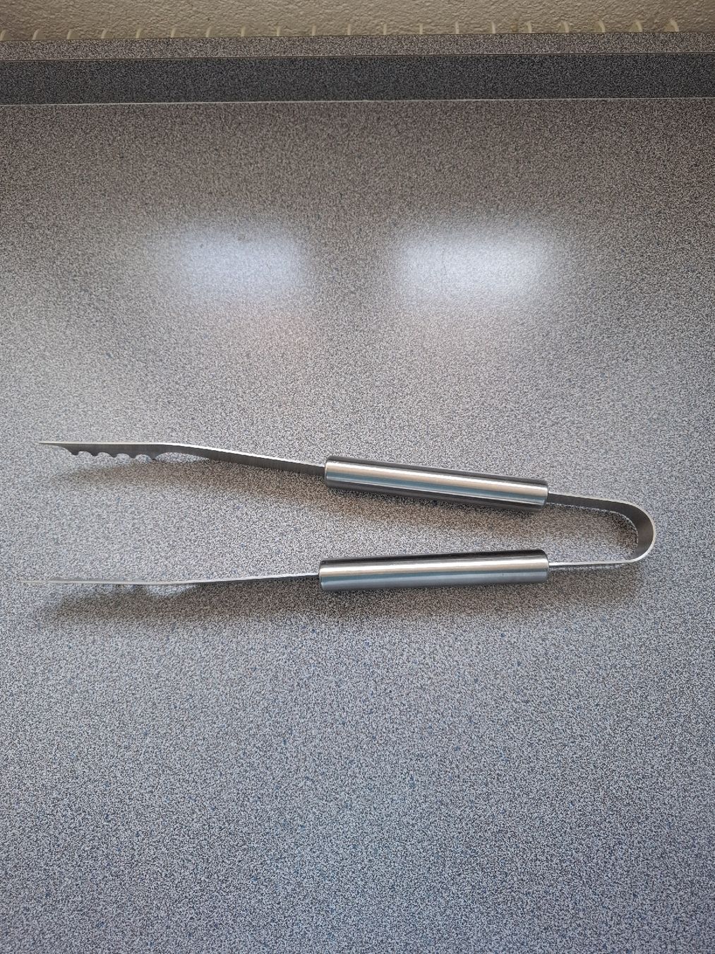 Set di posate: Grillzange Edelstahl gebraucht – Usato da Bern venduto da Madagaskarpalme
