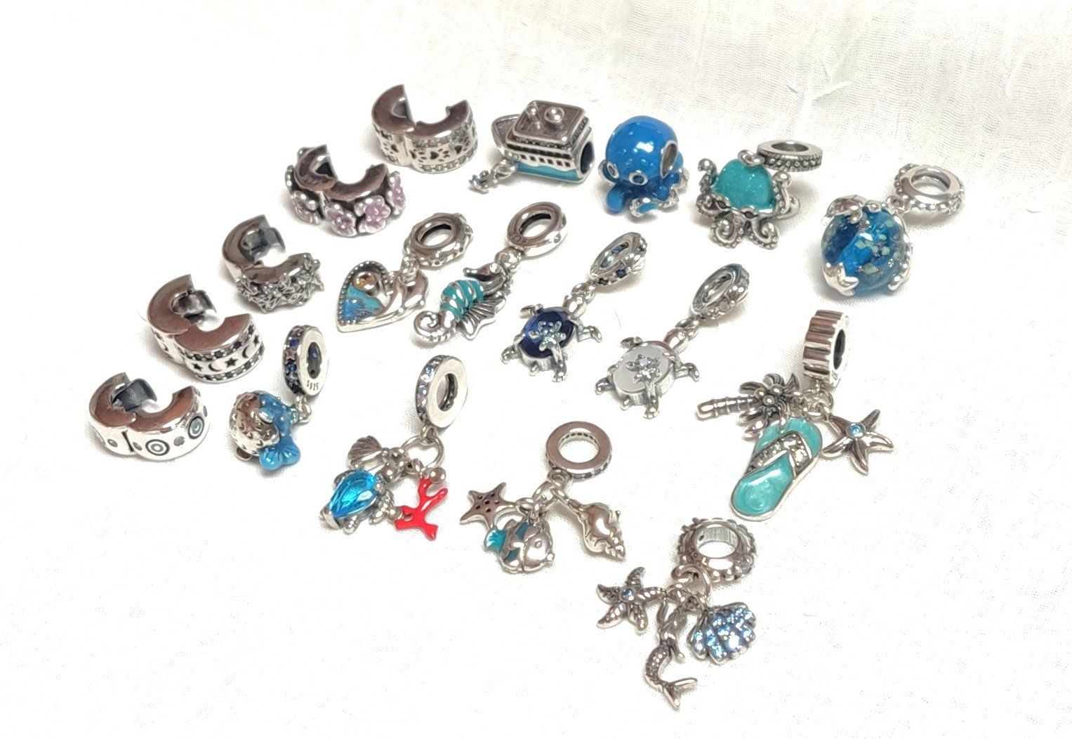 Ciondoli: Clip und charm für Armbänder. – Nuovo e nell'imballaggio originale da Lamboing venduto da Qtrica