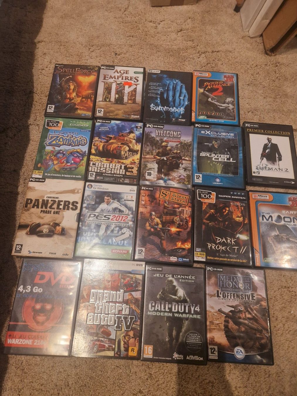 Lot 18 jeux PC rétro : GTA IV, Call of Duty 4, Hitman 2 (Gebraucht) in ...