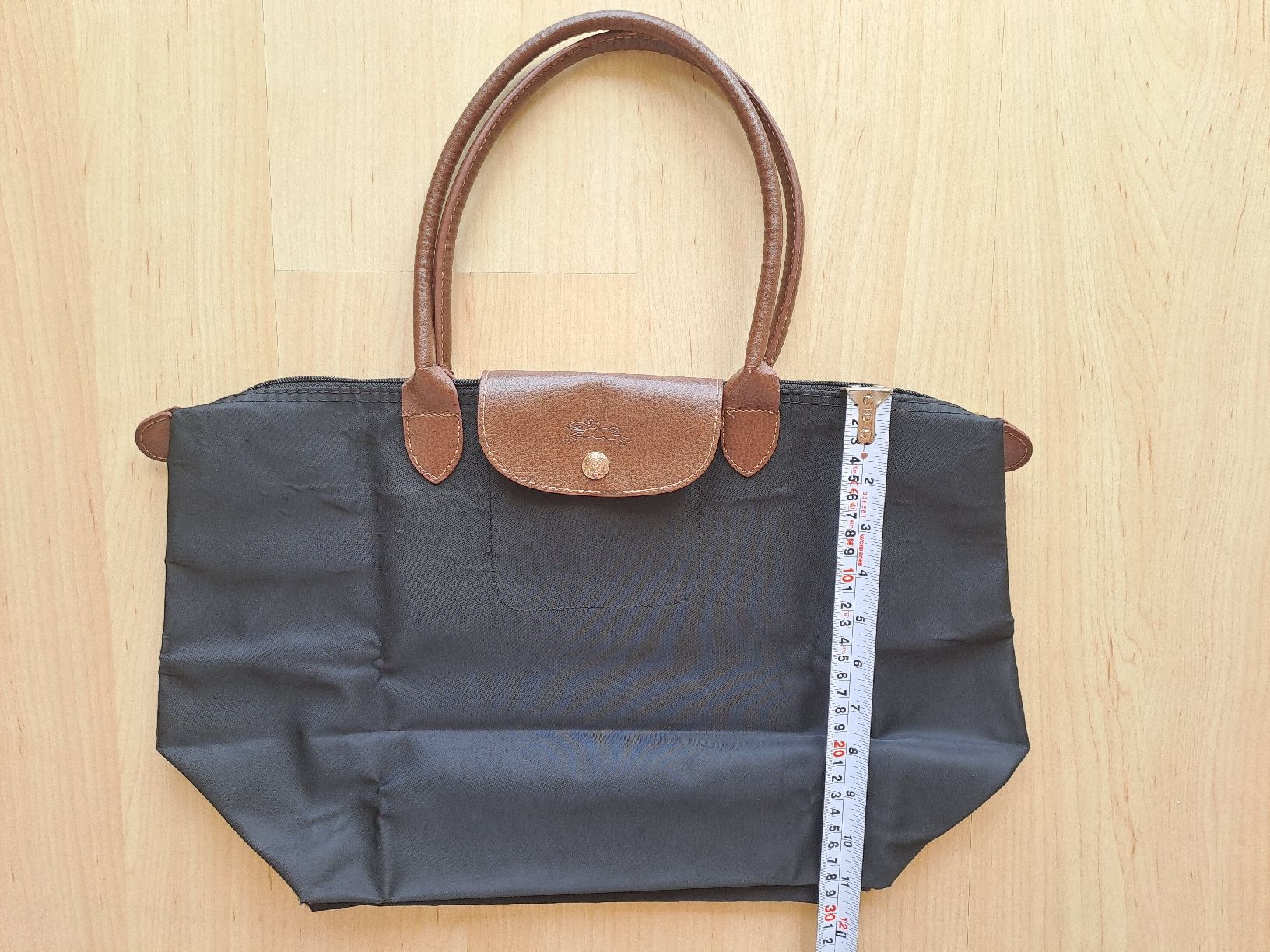Taschen für Damen: Sac à main de type Longchamp Pliage Noir – Defekt aus Denens von Chanchantevend 7