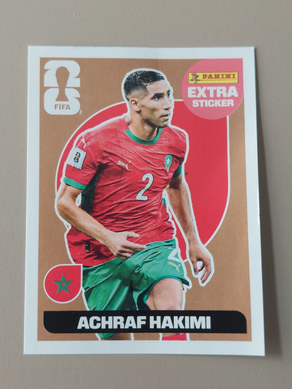 Panini Carte collezionabili: ACHRAF HAKIMI Panini Extra Sticker 2026 Bronze & Violet – Nuovo e nell'imballaggio originale da Zürich venduto da shimibene 1
