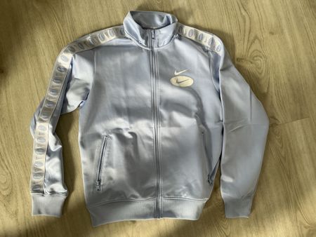 Veste de survêtement Nike bleu clair, zippée, bon état