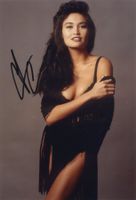 Original Autogramm von TIA CARRERE auf Großfoto
