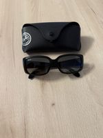 Lunettes de soleil Ray-Ban noires élégantes, parfaites!