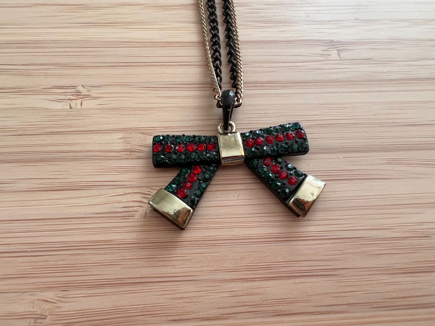 Catenine: Bow pendant long necklace – Usato da Genève venduto da Ballpencase