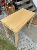 Ausziehbarer Tisch