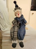 Clown-Puppe im Harlekin-Stil