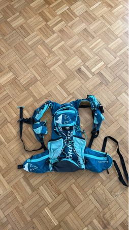 Sac de trail RaidLight bleu turquoise état très correct 