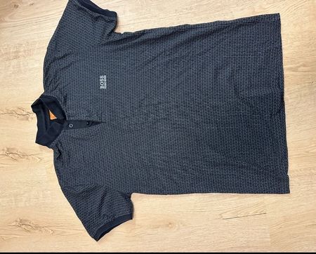 Polo BOSS noir à motifs discrets, taille L, parfait 