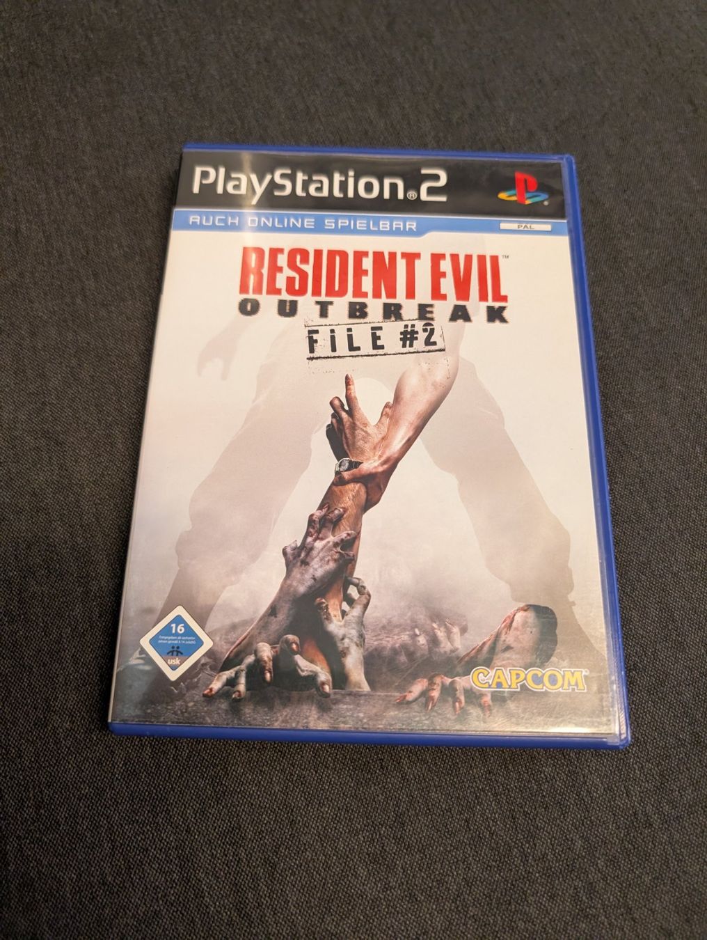 Giochi: Resident outbreak file 2 Sony playstation 2 – Usato da Giubiasco venduto da Ticinerd