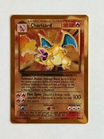 Charizard 4/102 Metal Card (25 Celebrations)