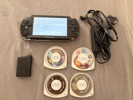 Sony PSP-1004 mit 4 Spielen, Ladegerät & neuem Akku