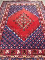 Tapis d'Orient  rouge-bleu authentique bon état
