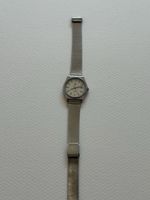 Montre femme Tissot quartz bracelet acier couleur argent