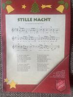 Musiknoten: Stille Nacht, Macht hoch die Tür, Kommet, etc.