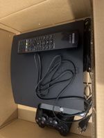 Sony PlayStation 3 Slim mit Fernbedienung und Controller