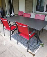 Gartentisch schwarz mit 6 roten Stühlen, 95 x 180 cm