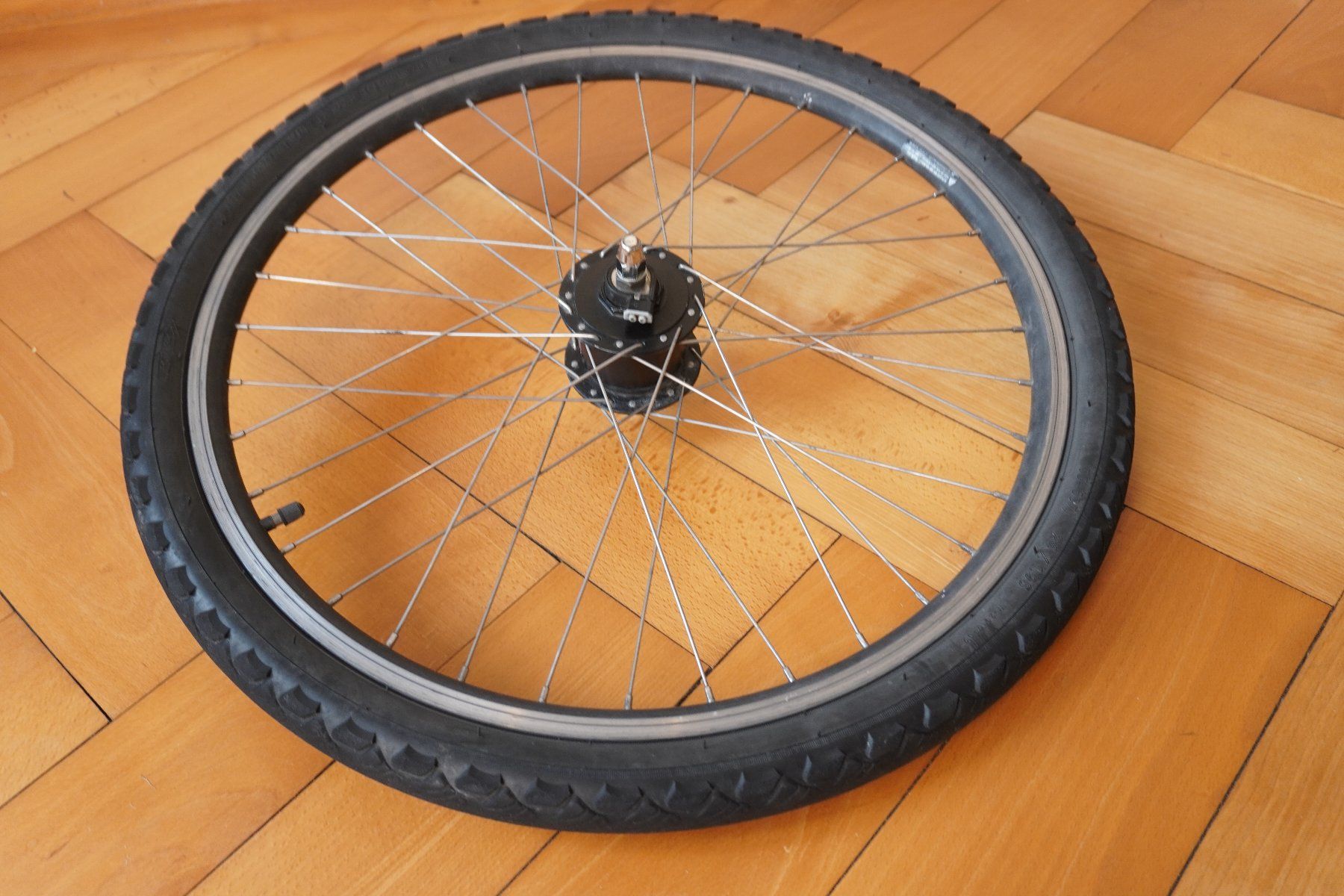 Shimano Ersatzteile: Vorderrad Nabendynamo ShimanoNexus 24" Kinder+Ersatzschlauch – Gebraucht aus Thunstetten von blob87