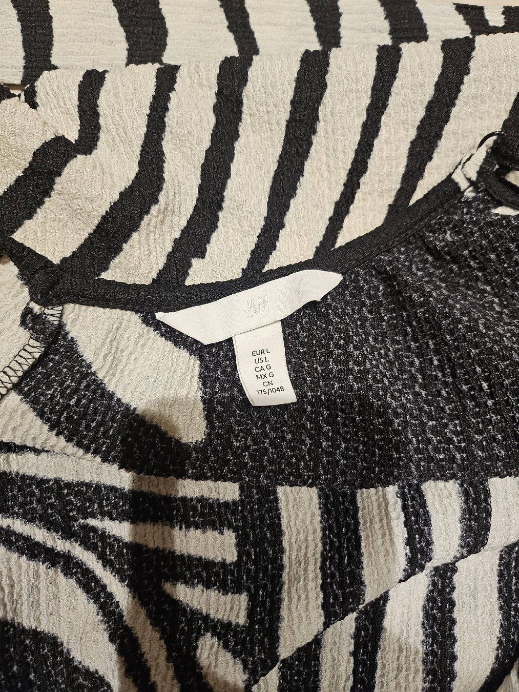 H&M Tute: Jumpsuit H&M gr.L schwarz creme – Usato da Allschwil venduto da na.wi.90 5