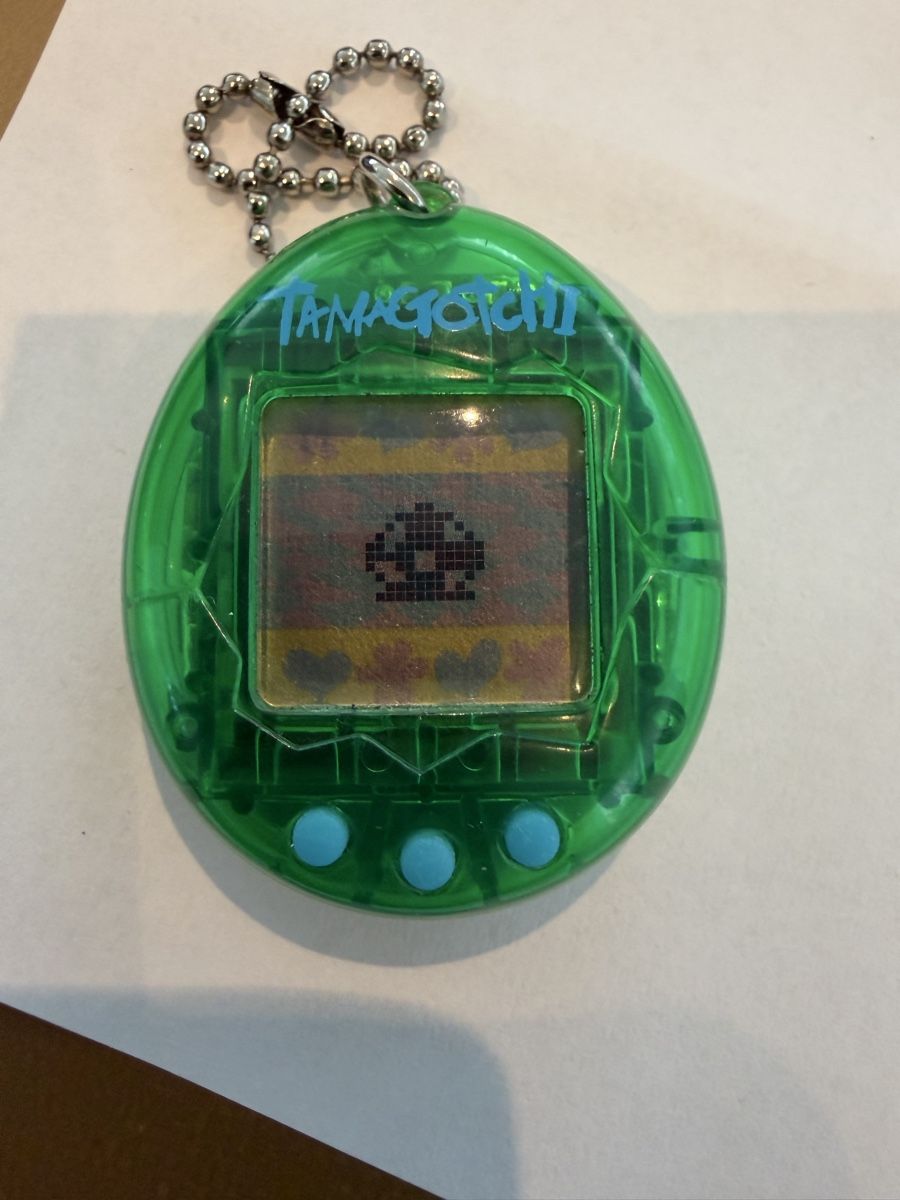 Jeux: Tamagotchi Skeleton Green 1997 – D'occasion à Echallens par JAR69 1