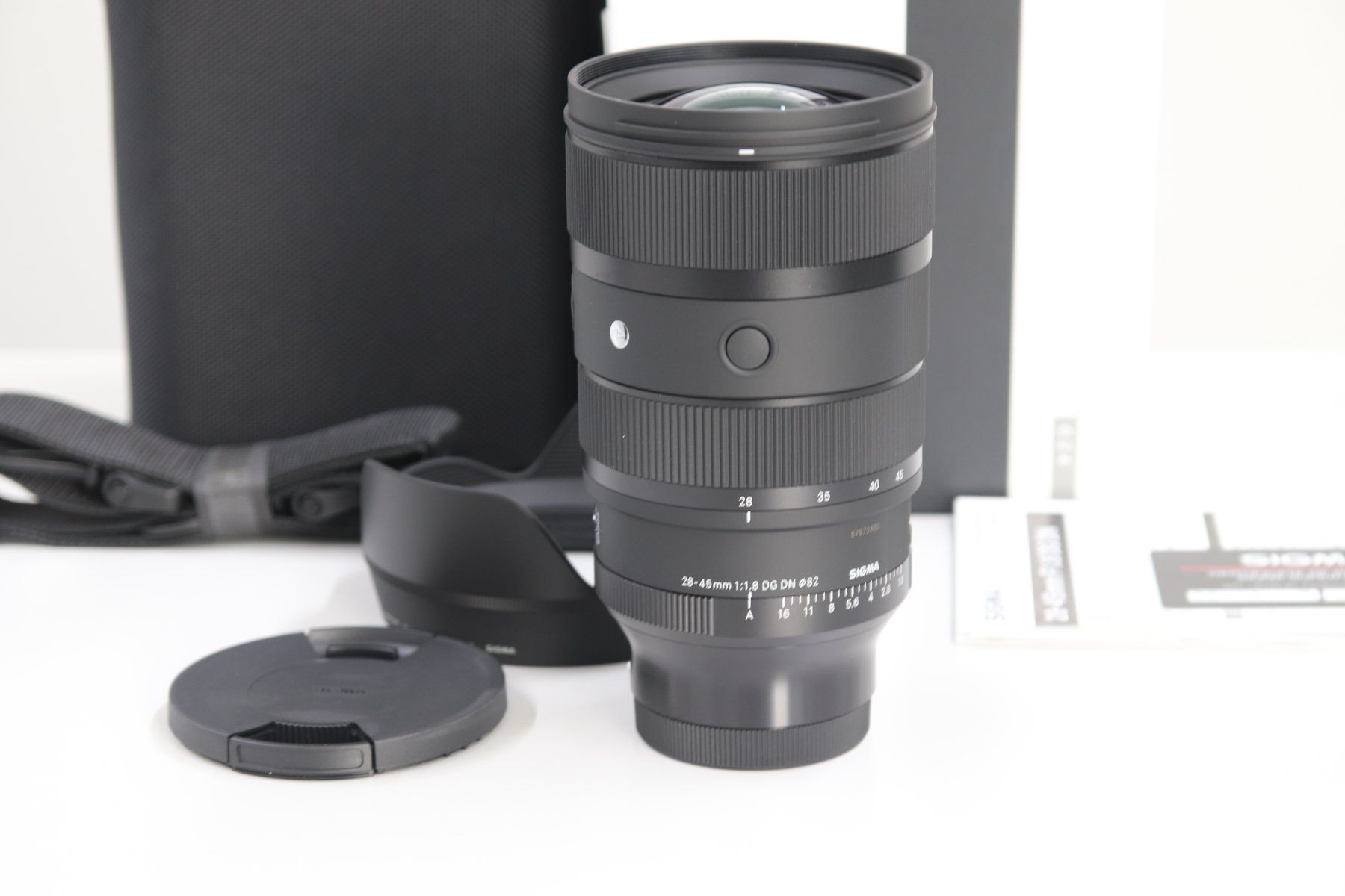Sigma Objektive: Sigma 28-45mm 1.8 DG DN Sony E-Mount / NEU – Neu und originalverpackt aus Zofingen von OWYSSAG